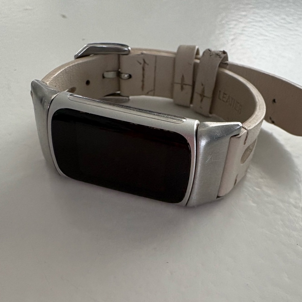 Fitbit charge 6 Silver Smartwatch with Cream Leather Band
